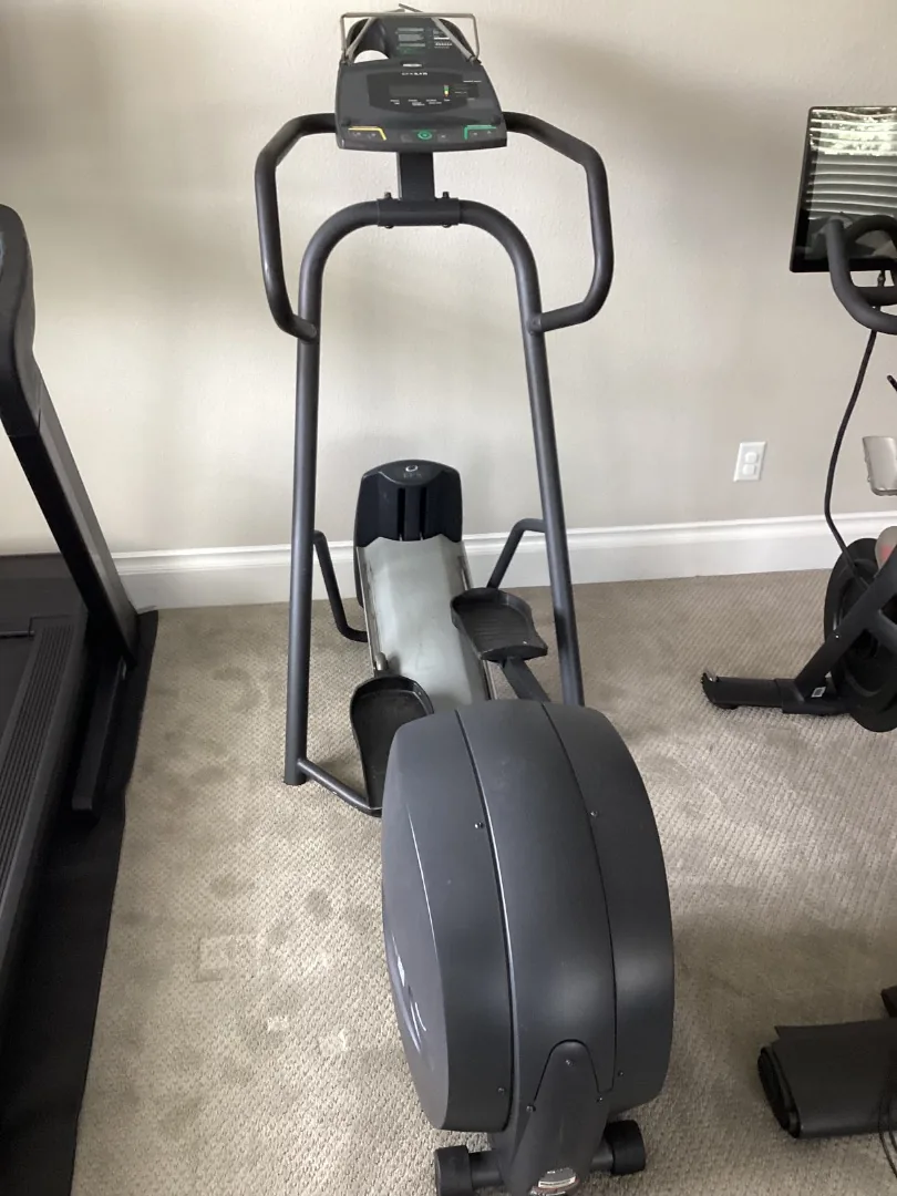 Precor EFX elliptical cross-trainer in a home gym