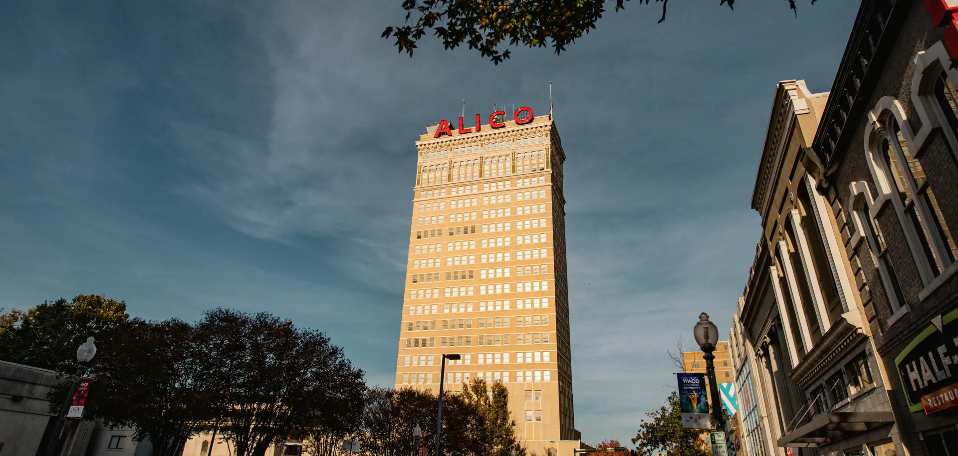 The ALICO Building in downtown Waco against an evening sky